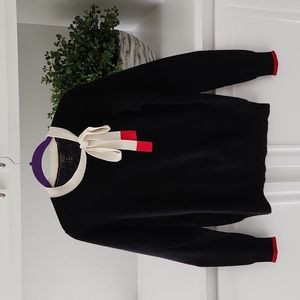 Black cashmere sweater with bow detail at neck, size xs